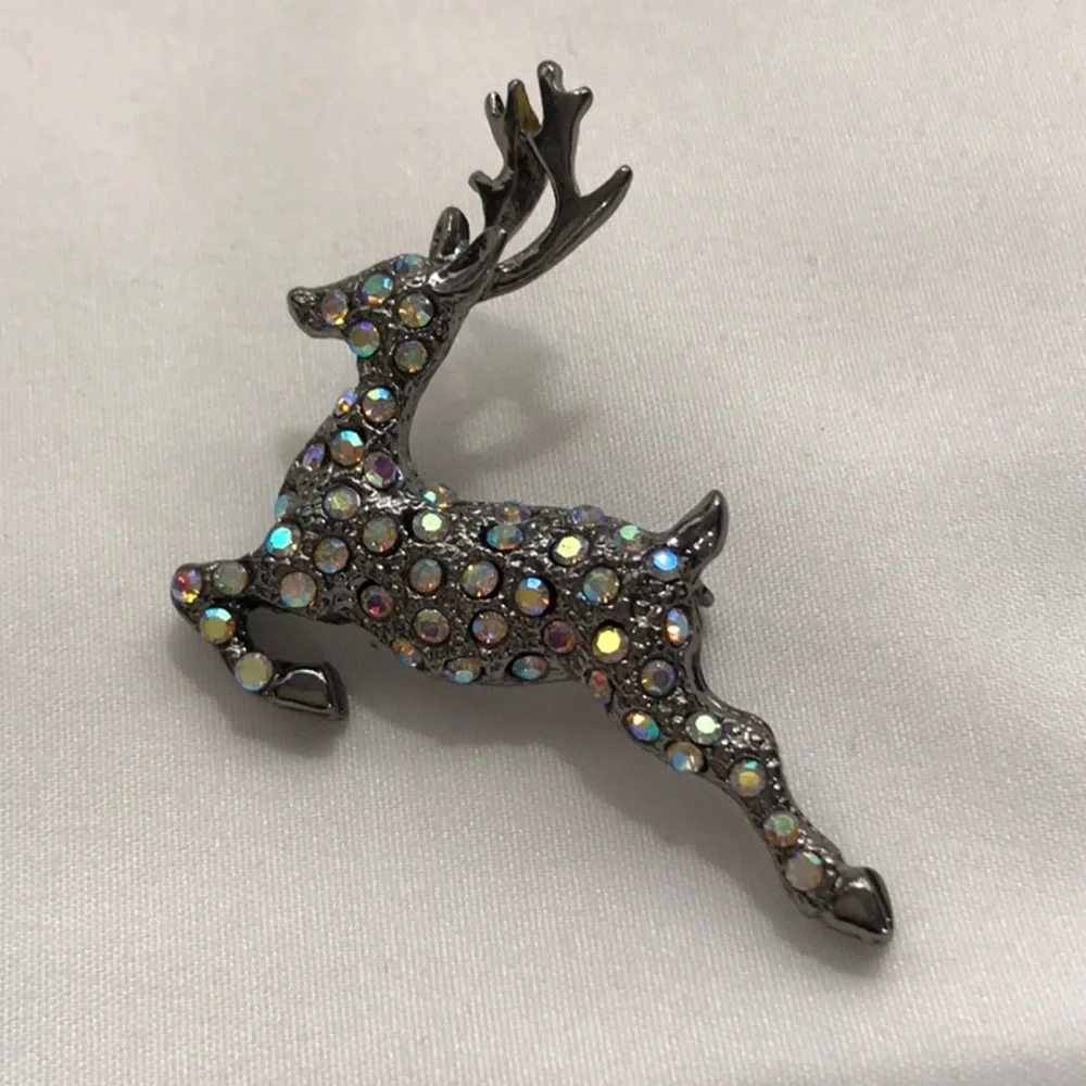 OTC deer brooch, beautiful iridescent rhinestones, 1 1/2 in length